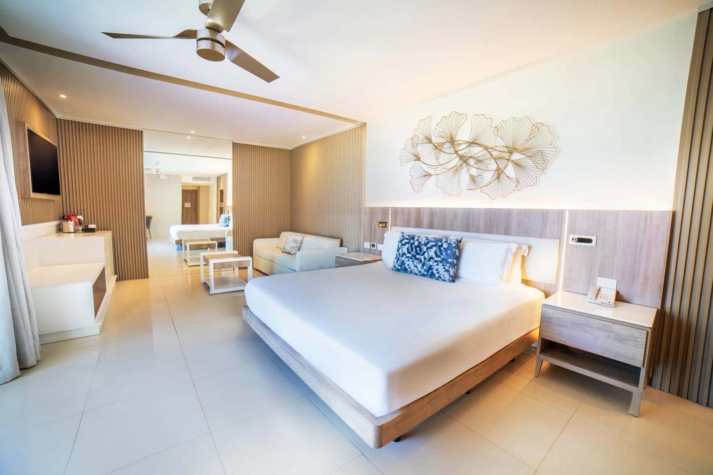 Bright modern guest room at Royalton Punta Cana